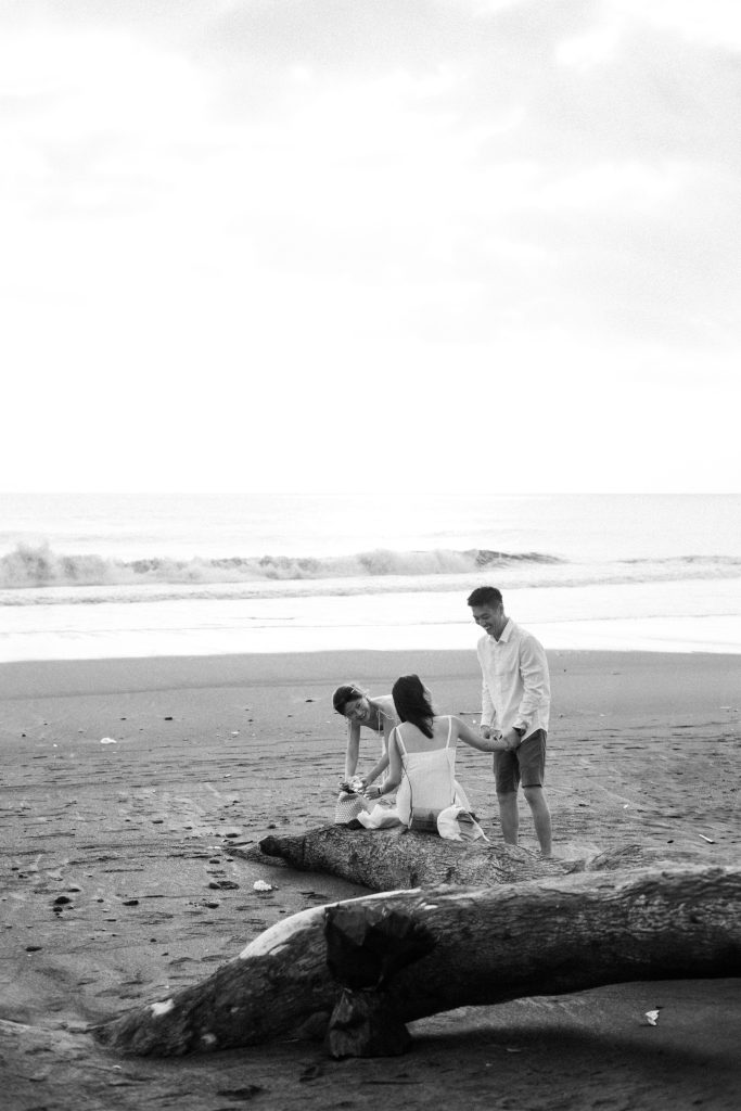 Behind-the-scenes of a Bali proposal photography session during heavy rain and flooding
